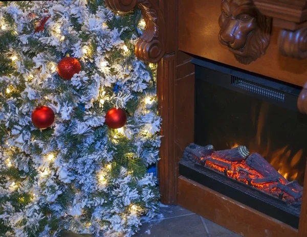 Christmas tree and fireplace. — Stock Photo, Image