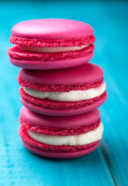 Colorful and tasty cookies makaroons on a wooden — Stock Photo, Image