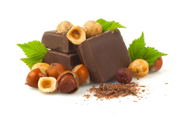 Chocolate with hazelnuts. — Stock Photo, Image