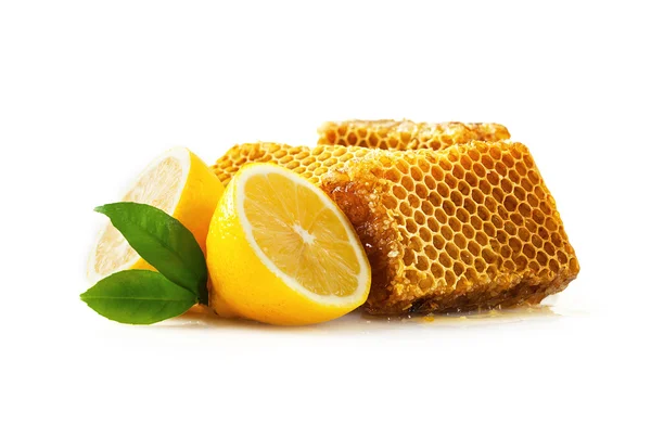 Honeycomb with lemon — Stock Photo, Image