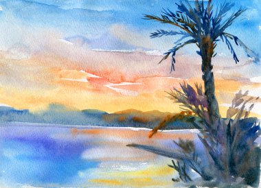 Deniz kıyısı ile tropikal günbatımı