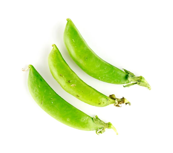 Tiga pods gula snap legume di atas putih — Stok Foto