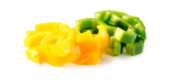 Macro van gele en groene paprika, in reepjes gesneden — Stockfoto