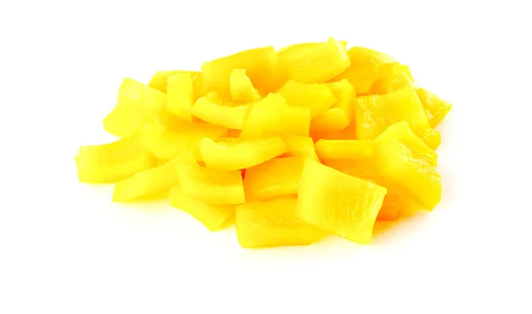 Macro van blokjes gele peper op witte — Stockfoto