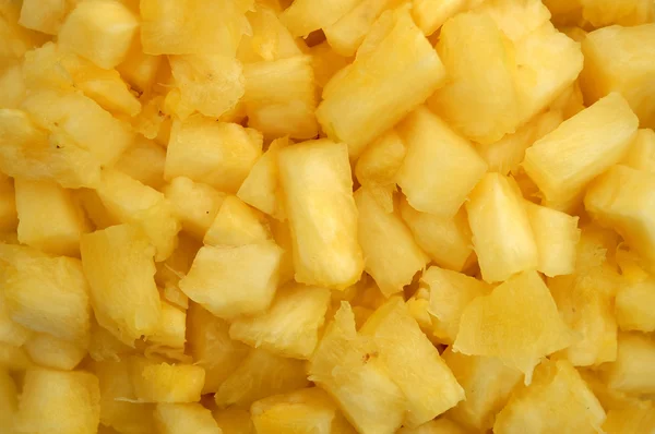 Närbild på ananas bitar — Stockfoto