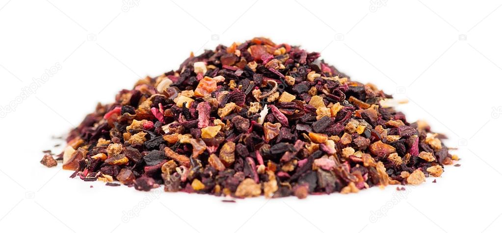 Macro of rose hip tea loose leaf granules in a pile on white bac
