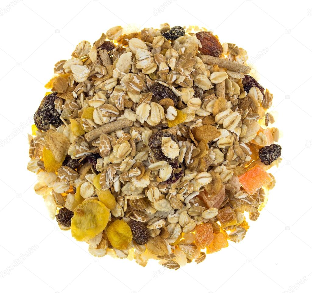 Pile of muesli isolated on white background