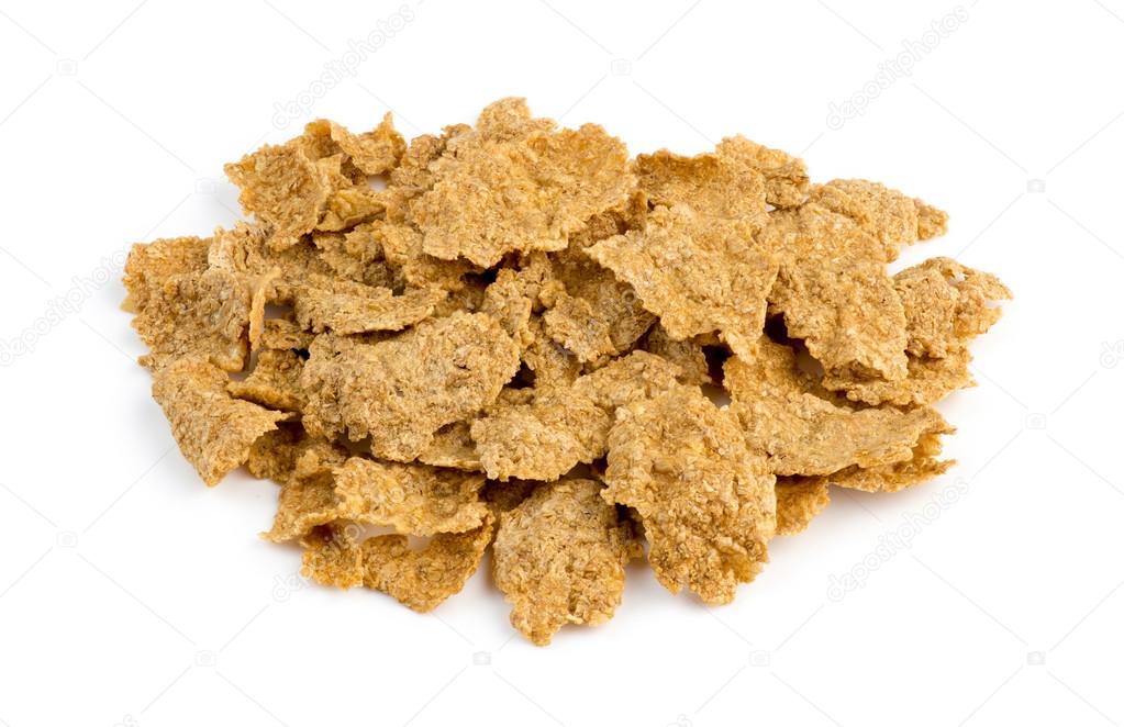 Macro closeup of bran flakes isolated against white