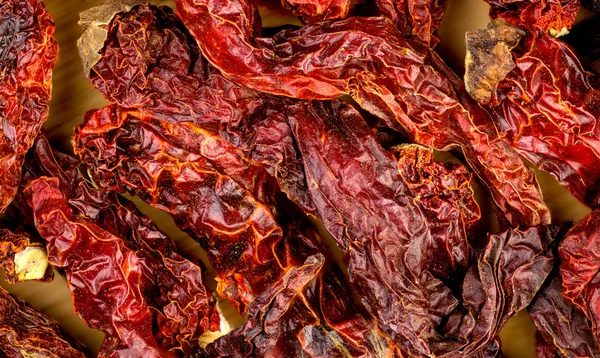 Makro-Nahaufnahme Hintergrund Textur von dehydriertem roten Kaschmir-Chili — Stockfoto