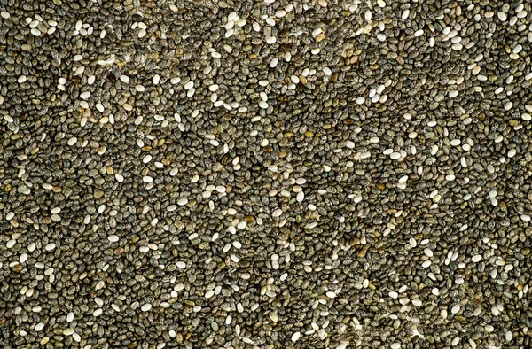 Macro background texture of black chia seeds — Stock Photo, Image
