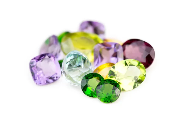 Mix of various natural Earth mined faceted gemstones — Stock Photo, Image
