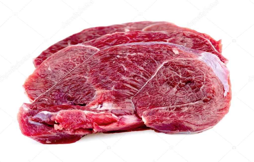 Raw beef meat cutlets on white background