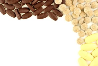 Magnezyum ve bitkisel çok renkli hapları Üstten Görünüm