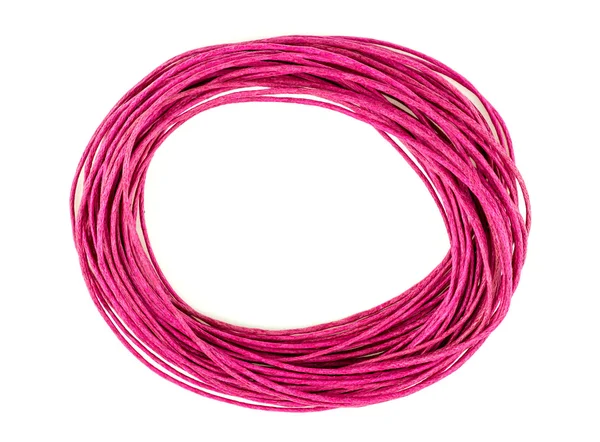 Rózsaszín körkörös hurok, fényes, színes kötél, zsineg elszigetelt ellen — Stock Fotó