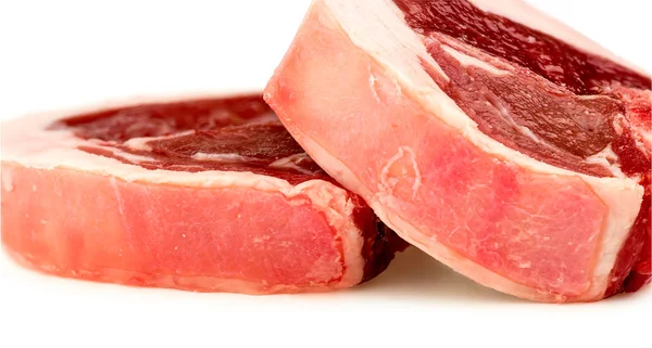 Closeup macro background texture of red meat lamb loin chops — Stock Photo, Image