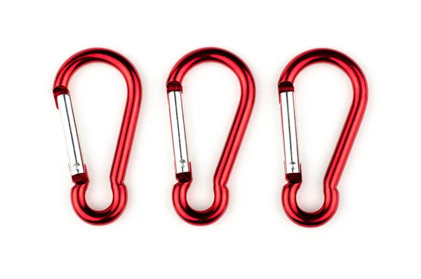 Set of three red hooks with spring loaded clasp isolated — Stock Photo, Image