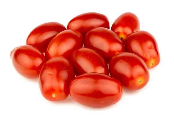 堆的孤立在工作室里的白色衬底上的红色葡萄西红柿 图库图片