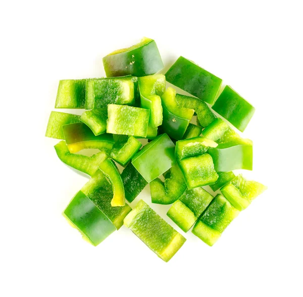 In stukken gehakt geïsoleerde antenne van groene paprika — Stockfoto