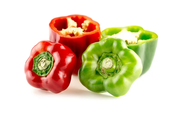 Red and green bell peppers — Stok fotoğraf