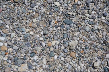 Kopya alanı olan küçük taşlar içeren çakıl taşı arkaplanı