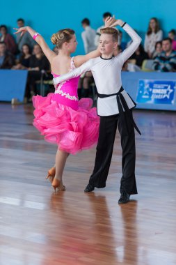 Strelskiy Aleksander and Ratomskaya Anna Perform Juvenile-1 Latin-American Program on the IDSA Championship Kinezis Star Cup