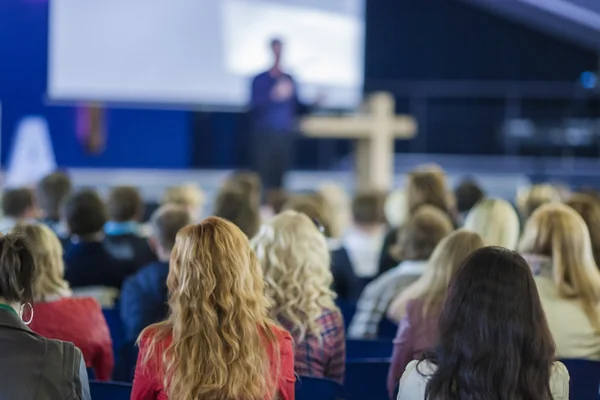 Male Professional Lecturer Speaking In front of the Group of People