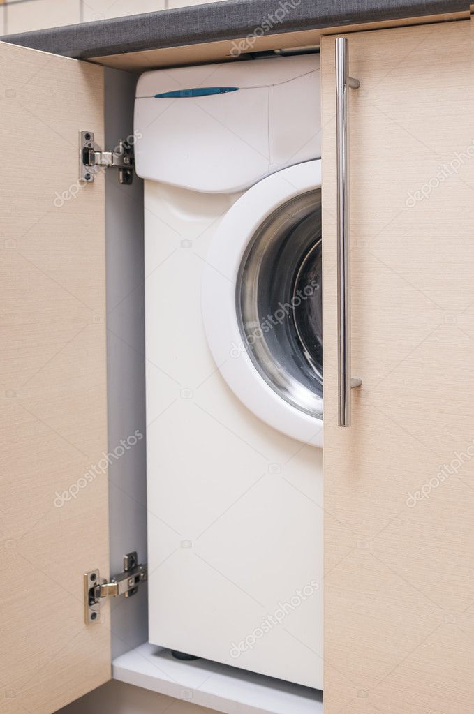 Kitchen Mini Cabinet With Portrable Washing Machine Inside Stock Kitchen Mini Cabinet With Portrable Washing Machine Inside Stock Photo