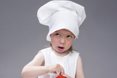 Mutfak ve Pişirme Kavramları ve Fikirleri. Aşçı Kılığına Yeni Hoş Sevimli Kafkas Kız Portresi