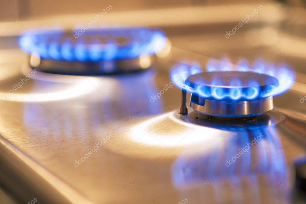 Two Gas Burners on Stove Surface Stock Photo by 61248063