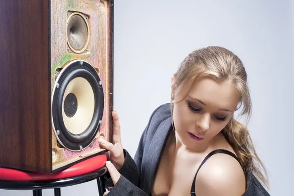 Portrait of Sexy and Seductive Young Caucasian Woman Listening t