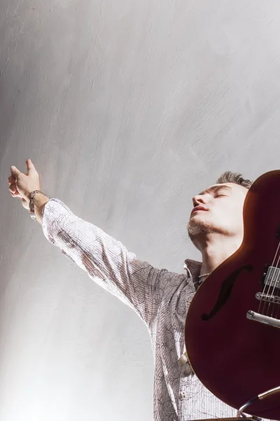 Praise and Worship Concepts. Young Caucasian Male Guitar Player 