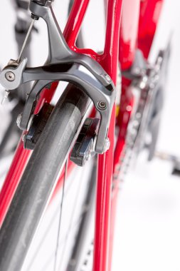Professional Road Bike Brakes Close Up Against  White
