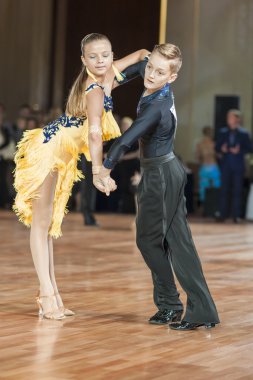 Minsk, Belarus ,September 26, 2015: Mihailov German and Lishik Polina Perform Juvenile-1 Latin-American Program