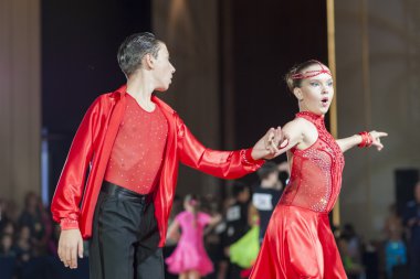 Minsk, Belarus ,September 26, 2015: Mihailov German and Lishik Polina Perform Juvenile-1 Latin-American Program