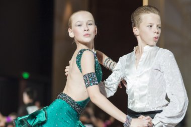 Minsk, Belarus ,September 26, 2015:Kolesnev Nikita and Lutsenko Dariya Perform Juvenile-1 Latin-American Program