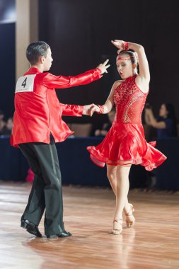 Minsk, Belarus ,September 26, 2015: Aslezov Iliya and Verholazova Alexandra Perform Juvenile-1 Latin-American Program