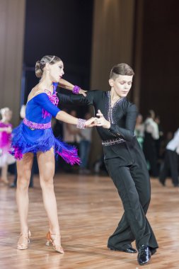 Minsk, Belarus ,September 26, 2015: Panysh Denis and Komar Irina Perform Juvenile-1 Latin-American Program
