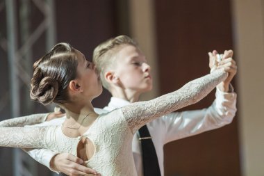 Minsk, Belarus,September 26, 2015: Haritonovich Trofim and Molchan Elizaveta  Perform Juvenile-1 Standard Program