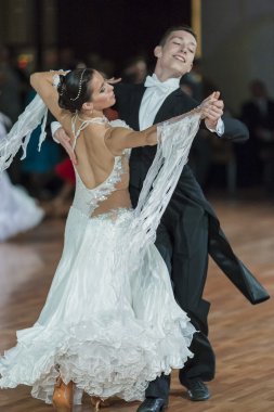 Minsk, Belarus-September 26, 2015: Kruk Timofey and Konopleva Diana Perform Juniors-2 Standard Program