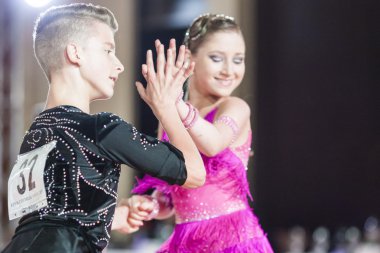 Minsk, Belarus ,September 26, 2015: Volkov Iliya and Artemieva Ekaterina Perform Juvenile-1 Latin-American Program on III International IDSA World Dance Championship Capital Cup Minsk- 2015 on September 26, 2015, in Minsk, Belarus