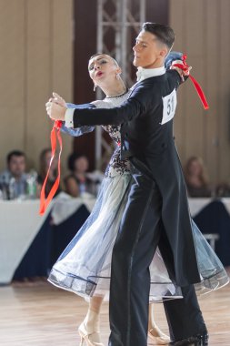 Minsk, Belarus-September 26, 2015: Korotkikh Mark and Pozova Anna Perform Adult Standard Program