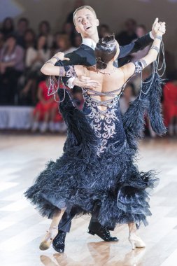 Minsk, Belarus-September 26, 2015:Kaliuzhnyy Vitaly and Kaletnik Vladyslava Perform Youth Standard Program