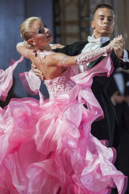 Minsk, Belarus-September 26, 2015: Kosyakov Egor and Belmach Anastasiya Perform Adult Standard Program