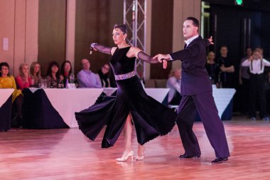 Minsk, Belarus ,September 27, 2015: Professional Italian Couple Perform ProAm Standard Program Dance Challenge on IDSA World Dance Championship Capital Cup Minsk 2015 on September 27, 2015, in Minsk, Belarus