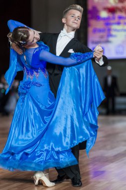 Minsk, Belarus-September 27, 2015: Volkov Iliya and Artemieva Ekaterina Perform Juvenile-1 Standard Program on III International IDSA World Dance Championship Capital Cup Minsk- 2015 on September 27, 2015, in Minsk, Belarus