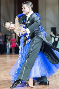 Minsk, Belarus-September 27, 2015: Kolesnev Sergey and Stanislavchik Polina Perform Youth Standard Program on III International IDSA World Dance Championship Capital Cup Minsk-2015 on September 27, 2015, in Minsk, Belarus