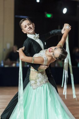 Minsk, Belarus-September 27, 2015: Kuntcevitch Iliya and Stasyuk Ekaterina Perform Youth Standard Program on III International IDSA World Dance Championship Capital Cup Minsk-2015 on September 27, 2015, in Minsk, Belarus