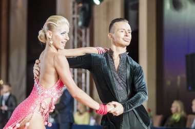 Minsk, Belarus-September 27, 2015: Egor Kosyakov and Anastasiya Belmach Perform Youth Latin- American Program on III International IDSA World Dance Championship Capital Cup Minsk-2015 on September 27, 2015, in Minsk, Belarus
