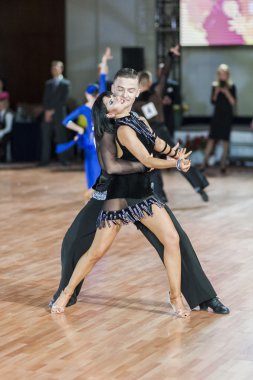 Minsk,Belarus-September 27,2015:Kulbachynskyy Lyubomyr and Samotiy Zoryana Perform Youth Latin-American Program on III International World Dance Championship Capital Cup Minsk-2015 on September 27,2015,Minsk, Belarus