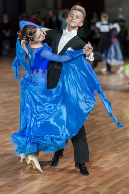 Minsk, Belarus-September 27, 2015: Volkov Iliya and Artemieva Ekaterina Perform Juvenile-1 Standard Program on III International IDSA World Dance Championship Capital Cup Minsk- 2015 on September 27, 2015, in Minsk, Belarus